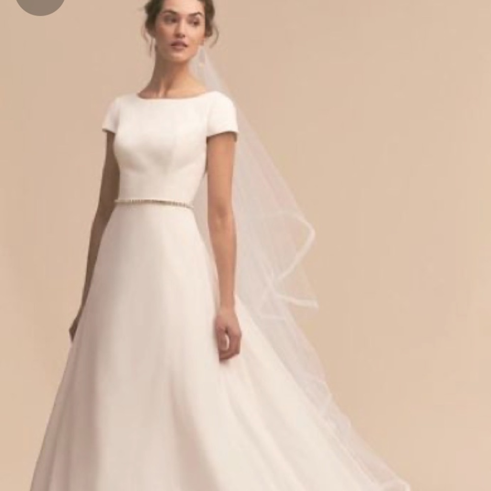 Crest Whispers and Echoes Gown